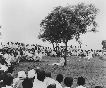 Meher Baba in a Gathering at Meherabad